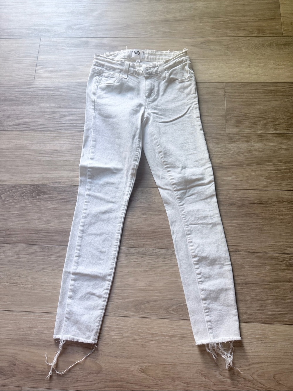 PAIGE White Skinny Jeans with Raw Hem
